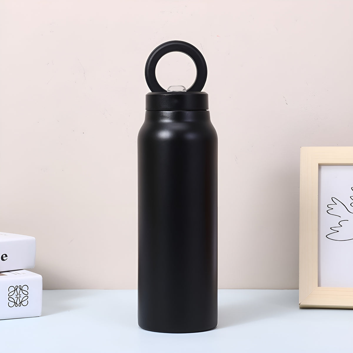 Botella con soporte magnetico para telefono