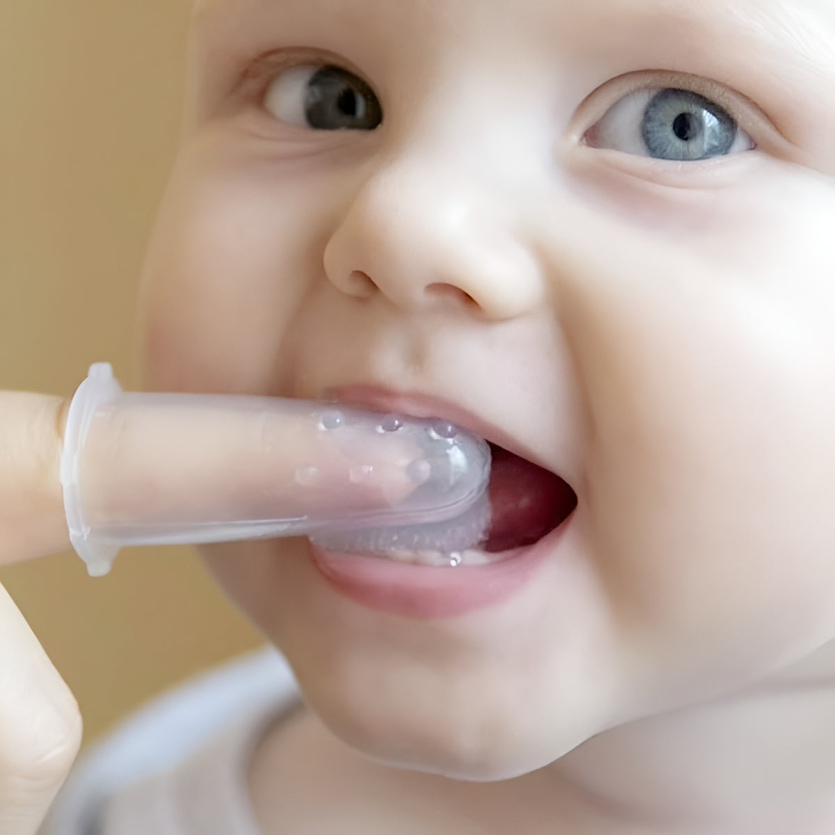 Dedal de silicona para higiene dental de bebés