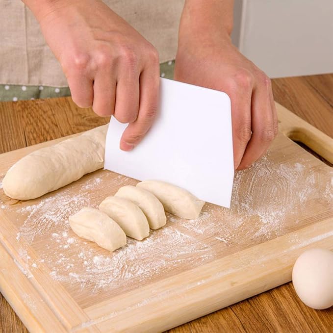 Raspador de masa de plástico