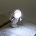 Lampara de escritorio de lectura con forma de astronauta usb – Tienda online NQLN Store Venezuela