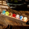 Bolas de galaxia con base de madera y luz LED – Comprar al mejor precio en NQLN Store Venezuela