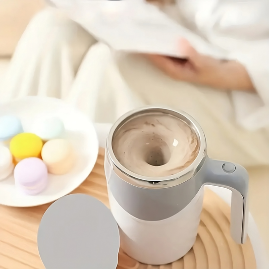Taza de cafe con agitacion automatica