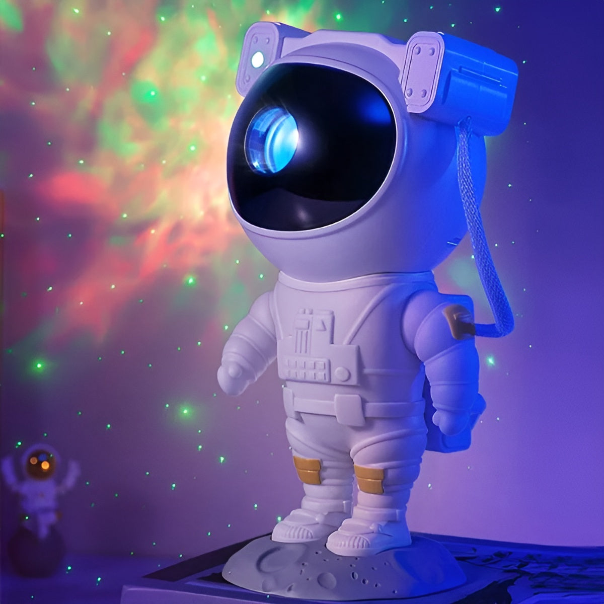 Proyector de luz nocturna 2 en 1 con forma de astronauta