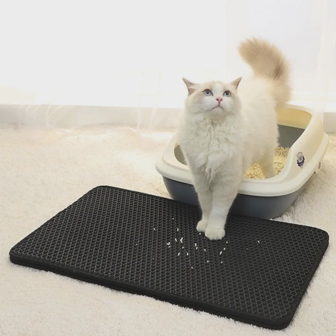 Alfombrilla de arena para gatos